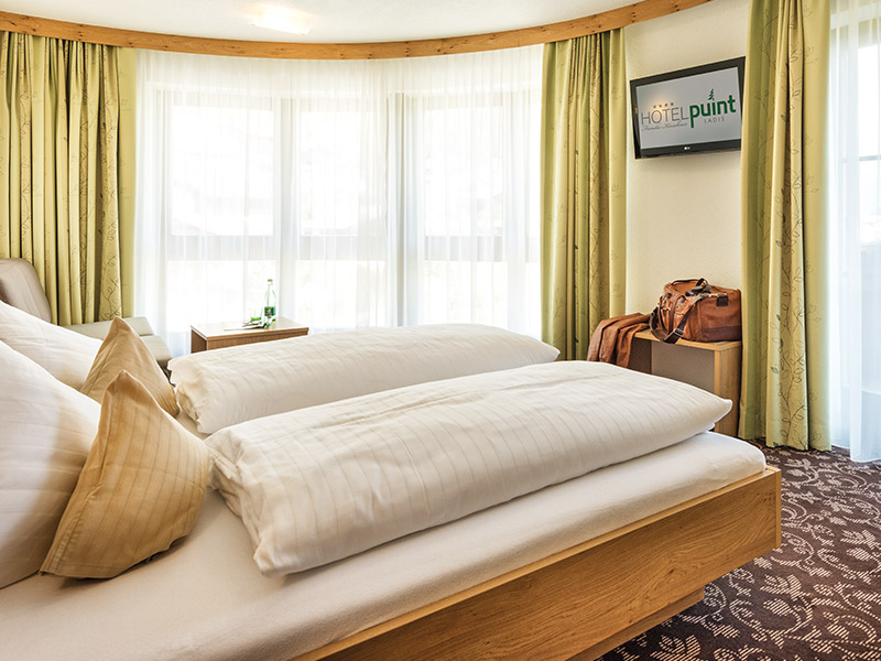 Hotel_Puint_Wellnesshotel_Naturhotel_Serfaus_Fiss_Ladis_Tirol_Zimmer_Suiten_Komfortzimmer_800x600_05.jpg